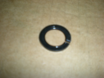 Wheel washer for nut
